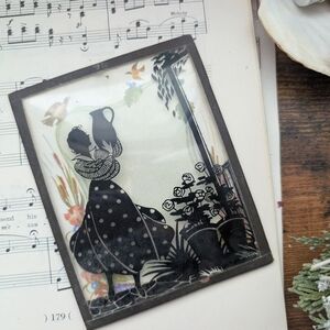 Vintage Silhouette Art with Floral Accents
